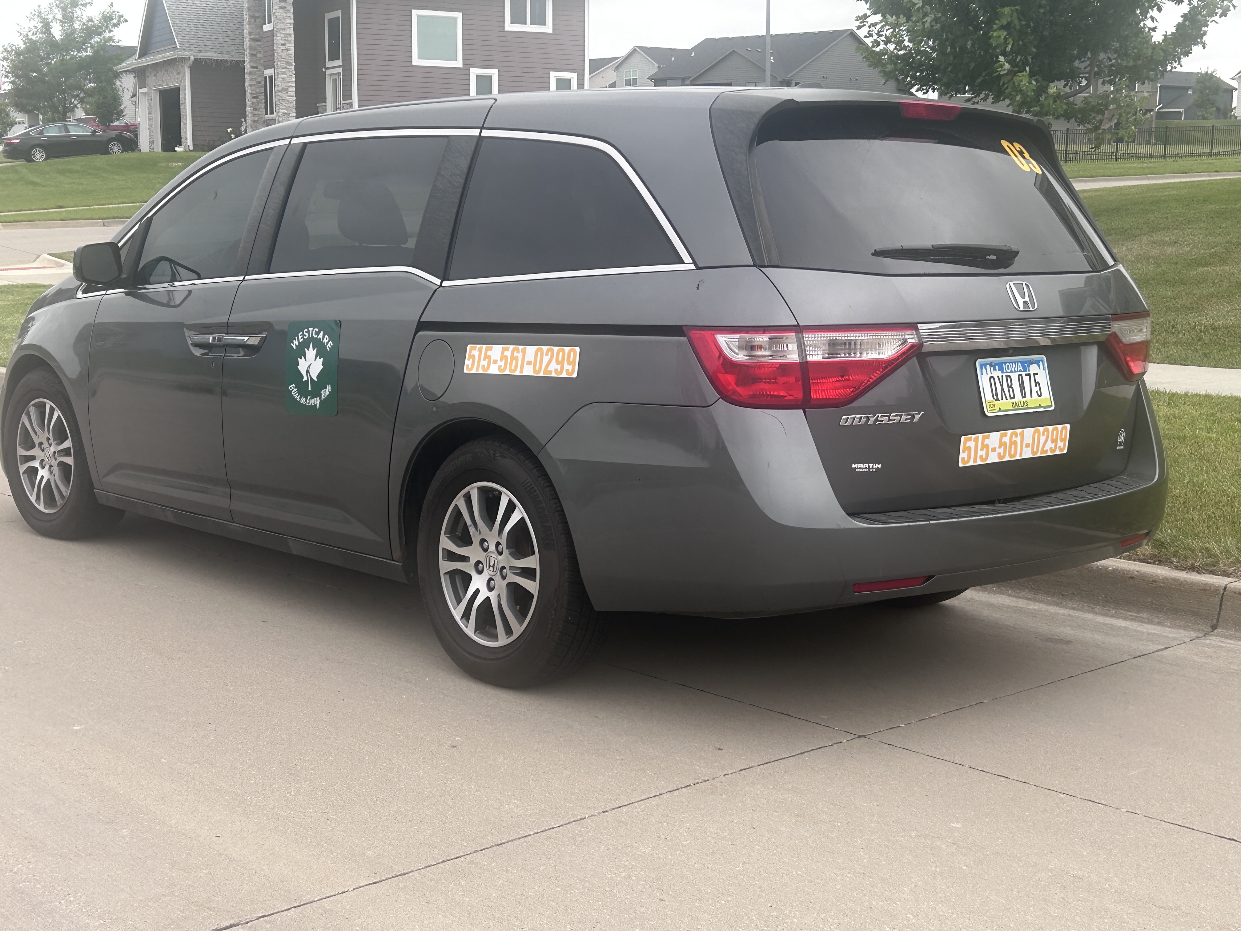 Gray non-emergency medical transport van
